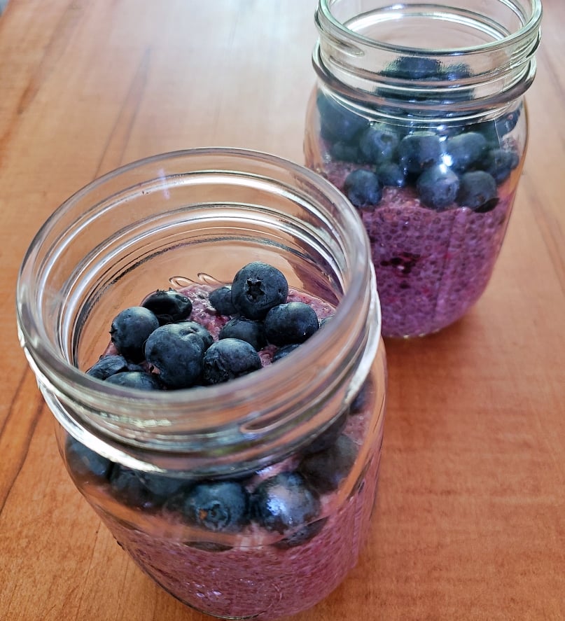 2 Blueberry Chia Parfaits in mason jars