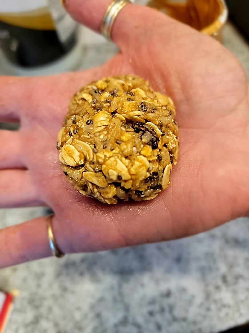 Muesli Cookie rolled on chefs hand