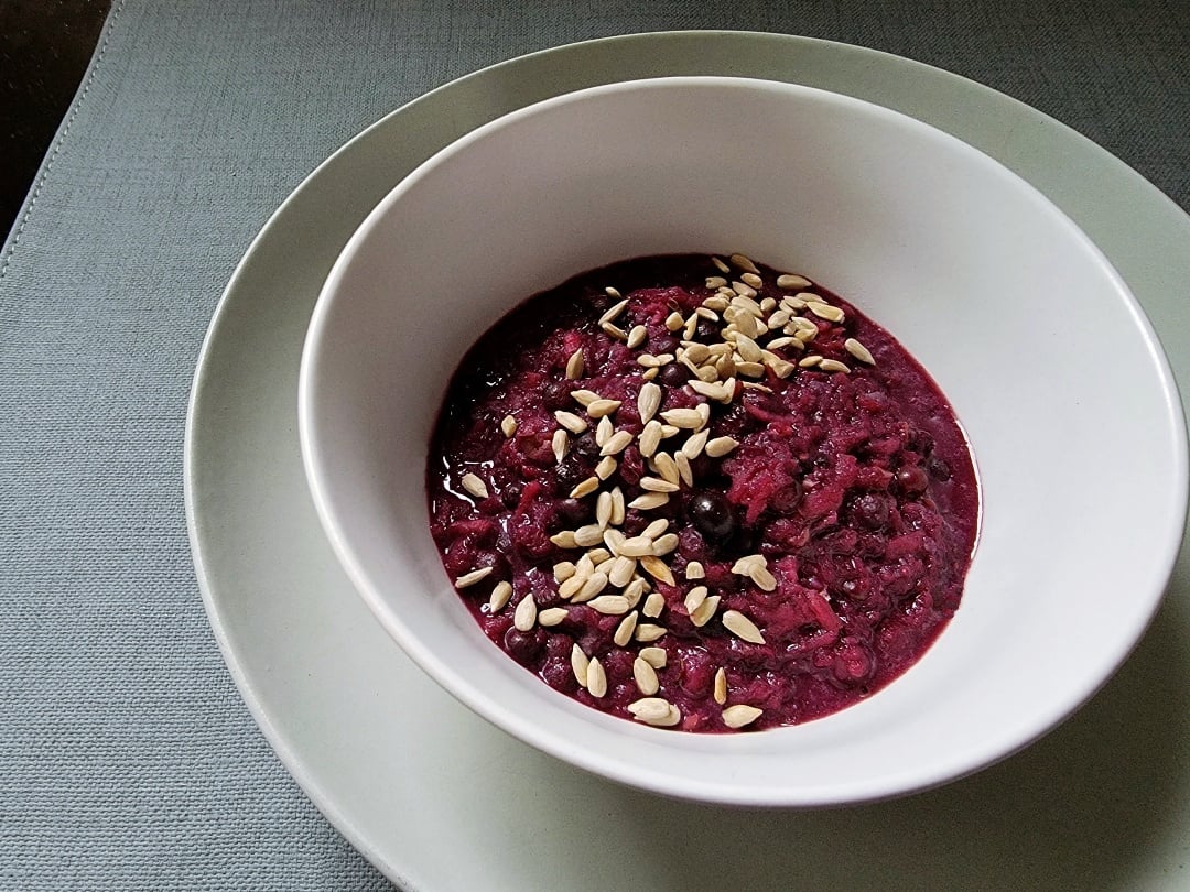 Warm Apple Berry Porridge in a bowl